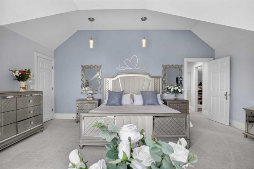 22 Ridge Pointe, Heritage Pointe, AB - Indoor Photo Showing Bedroom