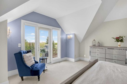 22 Ridge Pointe, Heritage Pointe, AB - Indoor Photo Showing Bedroom
