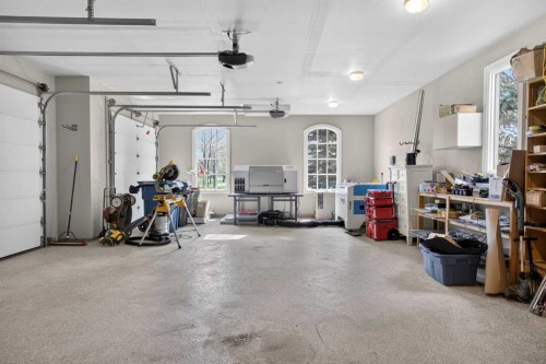 22 Ridge Pointe, Heritage Pointe, AB - Indoor Photo Showing Garage