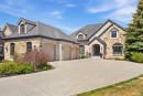 22 Ridge Pointe, Heritage Pointe, AB  - Outdoor With Deck Patio Veranda With Facade 
