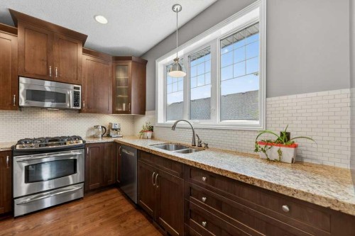 44 Mike Ralph Way Sw, Calgary, AB - Indoor Photo Showing Kitchen With Double Sink With Upgraded Kitchen