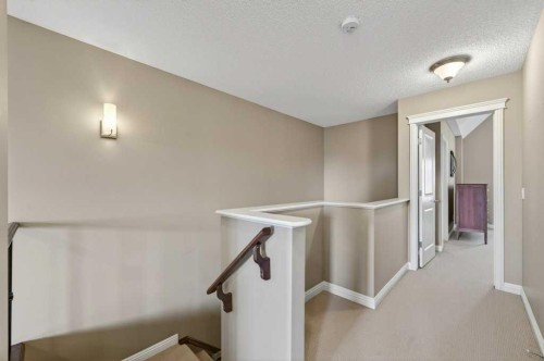 44 Mike Ralph Way Sw, Calgary, AB - Indoor Photo Showing Other Room