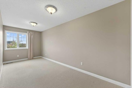 44 Mike Ralph Way Sw, Calgary, AB - Indoor Photo Showing Other Room