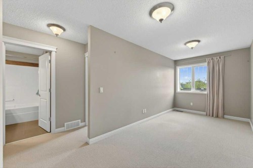 44 Mike Ralph Way Sw, Calgary, AB - Indoor Photo Showing Other Room