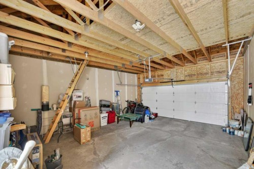 44 Mike Ralph Way Sw, Calgary, AB - Indoor Photo Showing Garage