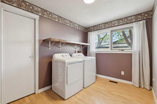 923 Midridge Drive Se, Calgary, AB - Indoor Photo Showing Laundry Room