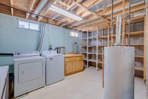 923 Midridge Drive Se, Calgary, AB - Indoor Photo Showing Laundry Room