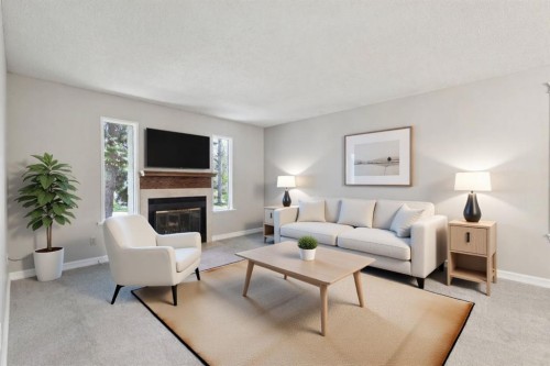 923 Midridge Drive Se, Calgary, AB - Indoor Photo Showing Living Room With Fireplace