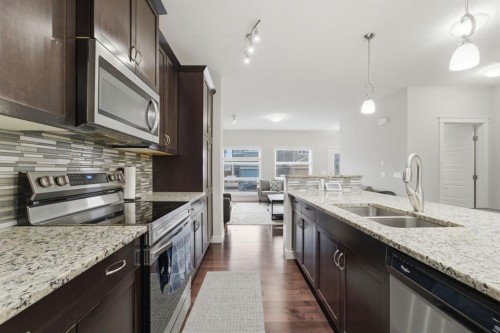 22 Redstone Road Ne, Calgary, AB - Indoor Photo Showing Kitchen With Stainless Steel Kitchen With Double Sink With Upgraded Kitchen