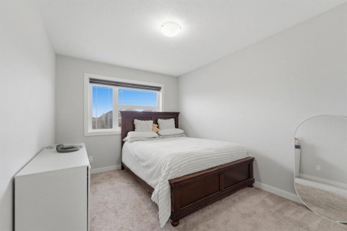 22 Redstone Road Ne, Calgary, AB - Indoor Photo Showing Bedroom