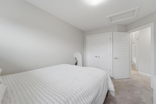 22 Redstone Road Ne, Calgary, AB - Indoor Photo Showing Bedroom