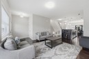 22 Redstone Road Ne, Calgary, AB  - Indoor Photo Showing Living Room 