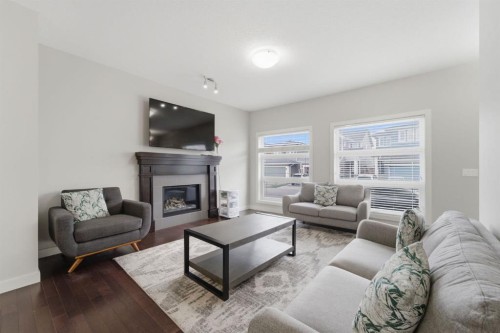 22 Redstone Road Ne, Calgary, AB - Indoor Photo Showing Living Room With Fireplace