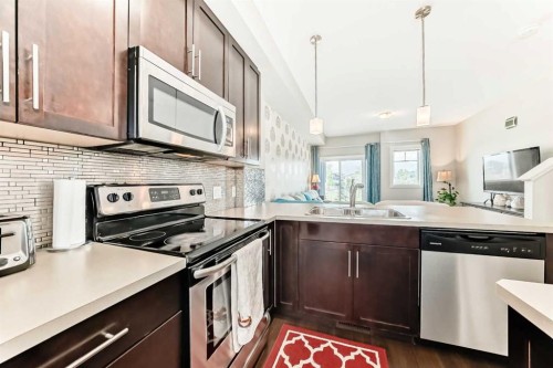 109 Redstone Circle Ne, Calgary, AB - Indoor Photo Showing Kitchen With Stainless Steel Kitchen With Double Sink With Upgraded Kitchen