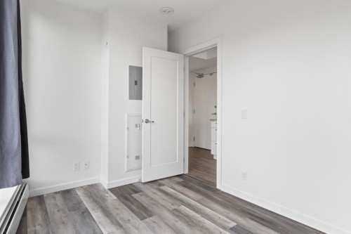 712-450 8 Avenue Se, Calgary, AB - Indoor Photo Showing Other Room
