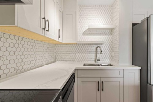 1402-13104 Elbow Drive Sw, Calgary, AB - Indoor Photo Showing Kitchen With Double Sink