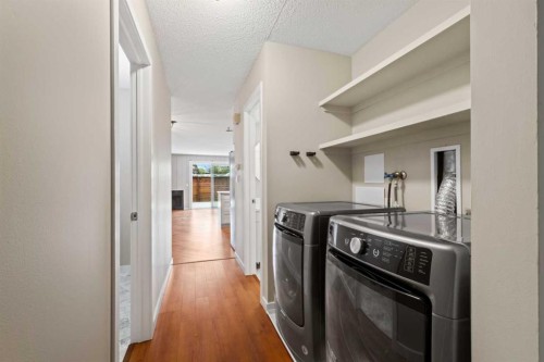 1402-13104 Elbow Drive Sw, Calgary, AB - Indoor Photo Showing Laundry Room