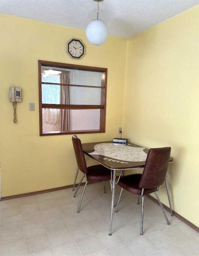 1628 Rouleau Crescent Se, Calgary, AB - Indoor Photo Showing Dining Room