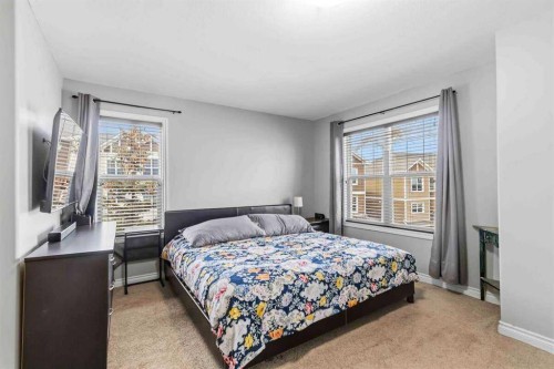 14-180 Riverstone Ridge, Fort Mcmurray, AB - Indoor Photo Showing Bedroom