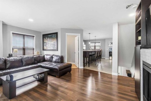 14-180 Riverstone Ridge, Fort Mcmurray, AB - Indoor Photo Showing Living Room With Fireplace