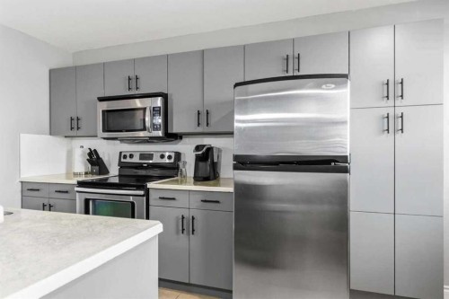 14-180 Riverstone Ridge, Fort Mcmurray, AB - Indoor Photo Showing Kitchen With Upgraded Kitchen