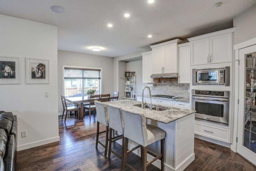 29 Drake Landing Loop, Okotoks, AB - Indoor Photo Showing Kitchen With Upgraded Kitchen
