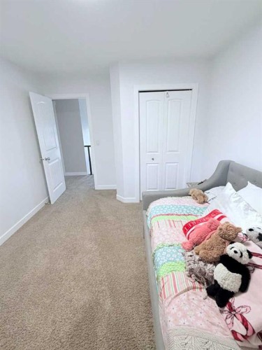 29 Drake Landing Loop, Okotoks, AB - Indoor Photo Showing Bedroom