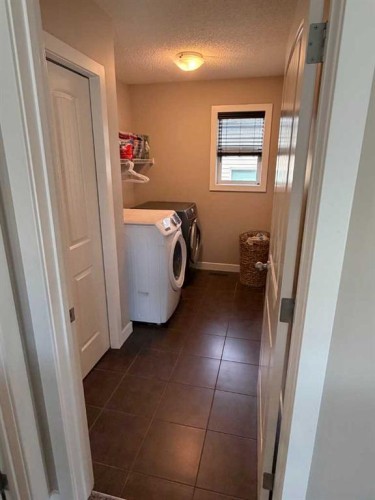 29 Drake Landing Loop, Okotoks, AB - Indoor Photo Showing Laundry Room