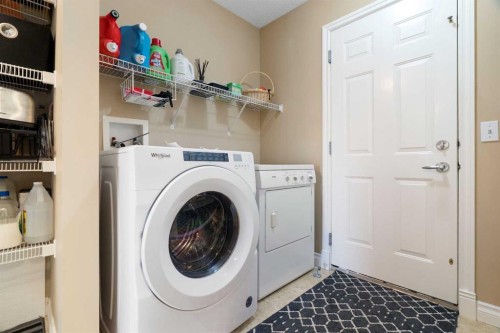 249 Springmere Way, Chestermere, AB - Indoor Photo Showing Laundry Room