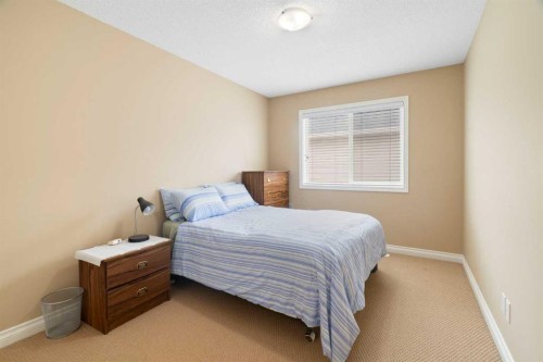 249 Springmere Way, Chestermere, AB - Indoor Photo Showing Bedroom