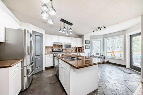 260 Westchester Way, Chestermere, AB - Indoor Photo Showing Kitchen With Stainless Steel Kitchen With Double Sink