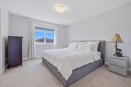 341 Midtown Gate Sw, Airdrie, AB - Indoor Photo Showing Bedroom
