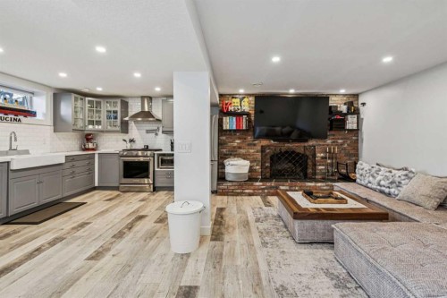 2219 Munro Drive Ne, Calgary, AB - Indoor With Fireplace