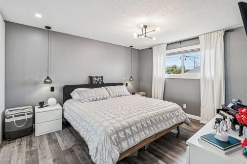 2219 Munro Drive Ne, Calgary, AB - Indoor Photo Showing Bedroom