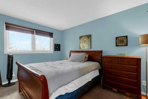 52 Strathclair Rise Sw, Calgary, AB - Indoor Photo Showing Bedroom