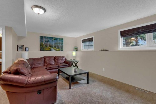 52 Strathclair Rise Sw, Calgary, AB - Indoor Photo Showing Living Room