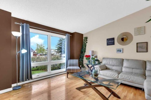 52 Strathclair Rise Sw, Calgary, AB - Indoor Photo Showing Living Room