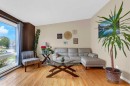 52 Strathclair Rise Sw, Calgary, AB  - Indoor Photo Showing Living Room 