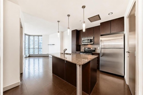 706-220 12 Avenue Se, Calgary, AB - Indoor Photo Showing Kitchen With Stainless Steel Kitchen With Double Sink With Upgraded Kitchen