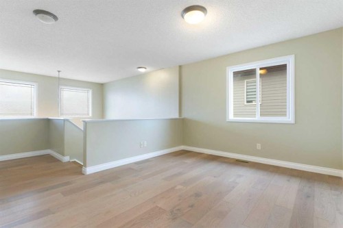 175 Sunset Close, Cochrane, AB - Indoor Photo Showing Other Room