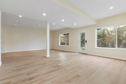 175 Sunset Close, Cochrane, AB - Indoor Photo Showing Other Room