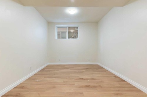 175 Sunset Close, Cochrane, AB - Indoor Photo Showing Other Room