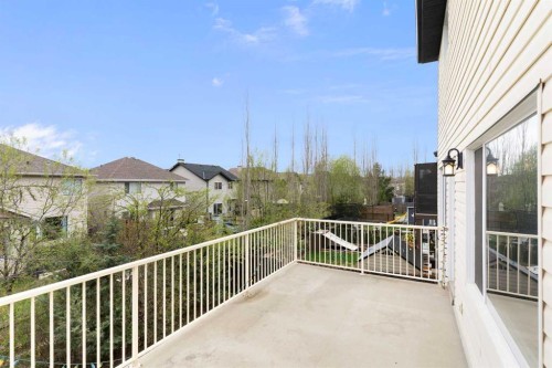 175 Sunset Close, Cochrane, AB - Outdoor With Deck Patio Veranda With Exterior