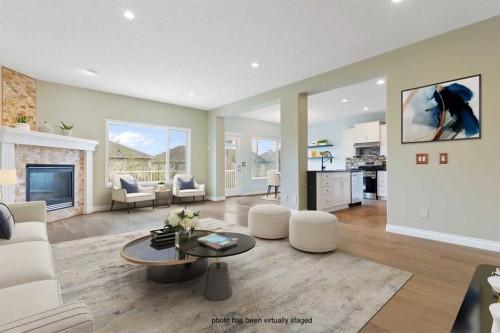 175 Sunset Close, Cochrane, AB - Indoor Photo Showing Living Room With Fireplace