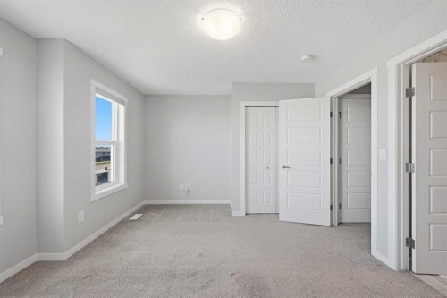 1322-7451 Falconridge Boulevard Ne, Calgary, AB - Indoor Photo Showing Other Room