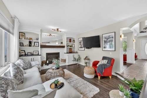 217 Mountain Park Drive Se, Calgary, AB - Indoor Photo Showing Living Room With Fireplace