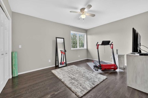 217 Mountain Park Drive Se, Calgary, AB - Indoor Photo Showing Gym Room