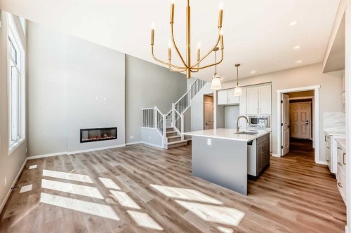 103 Mercado Crescent Se, Calgary, AB - Indoor Photo Showing Other Room With Fireplace