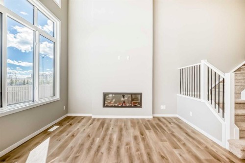 103 Mercado Crescent Se, Calgary, AB - Indoor With Fireplace