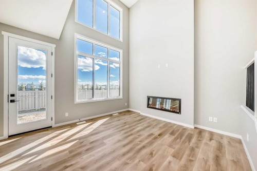 103 Mercado Crescent Se, Calgary, AB - Indoor With Fireplace